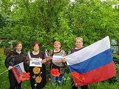 Жители сёл Краснянка и Рефлектор присоединились к акции "Флаги России"